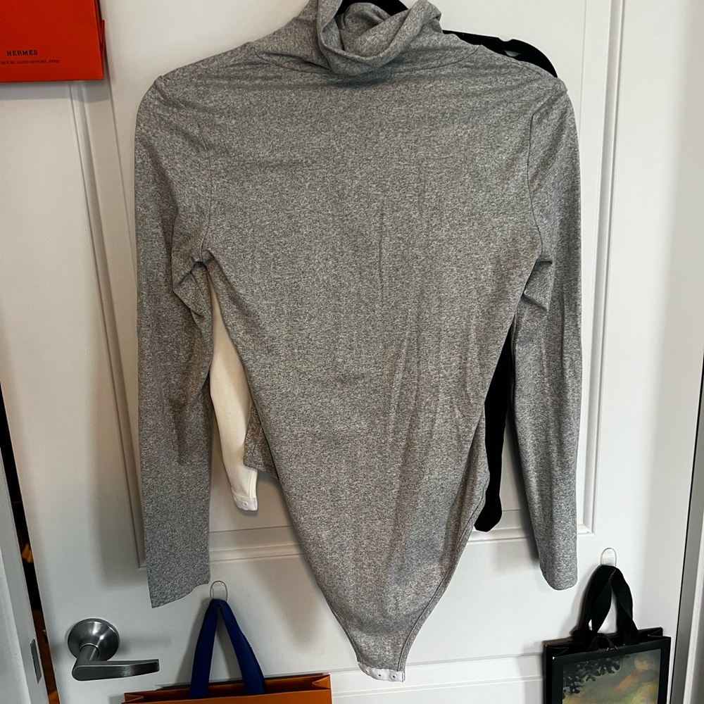 3 pack of  Long Sleeve Turtleneck Bodysuit